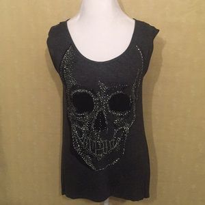 Skull studded top. Hi/Lo